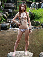 Petite Asian babe Sakurako loves to show her natural body outdoors